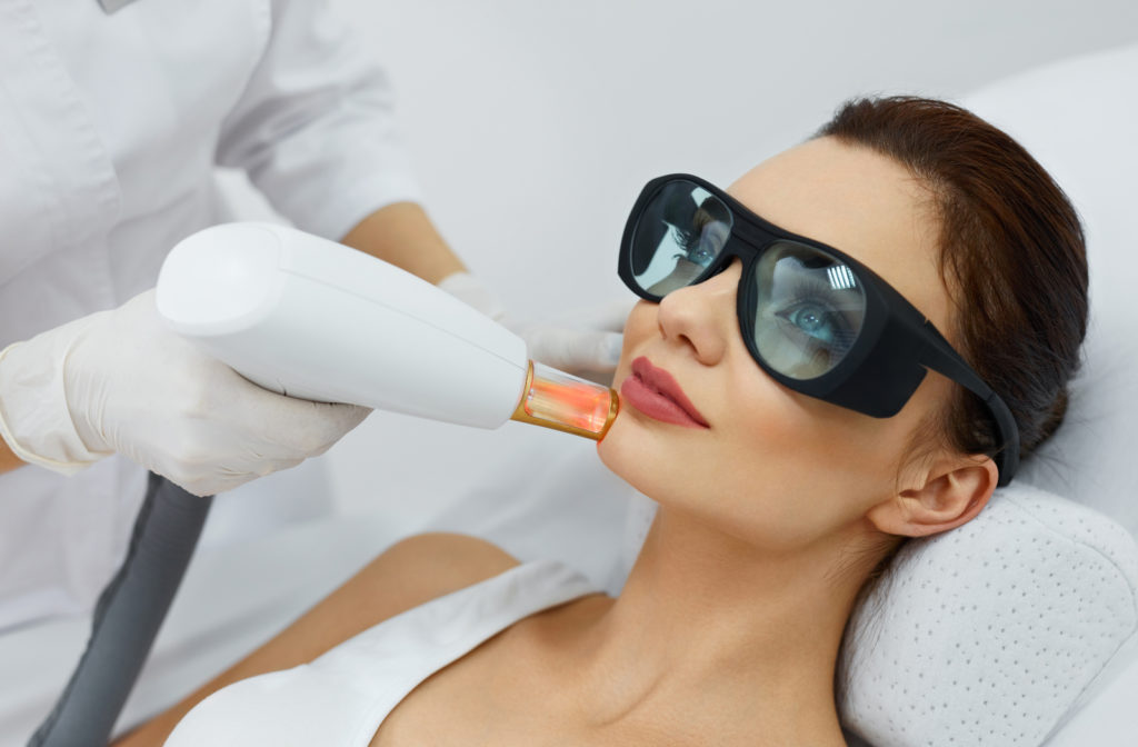 Women receiving laser skin resurfacing at clinic