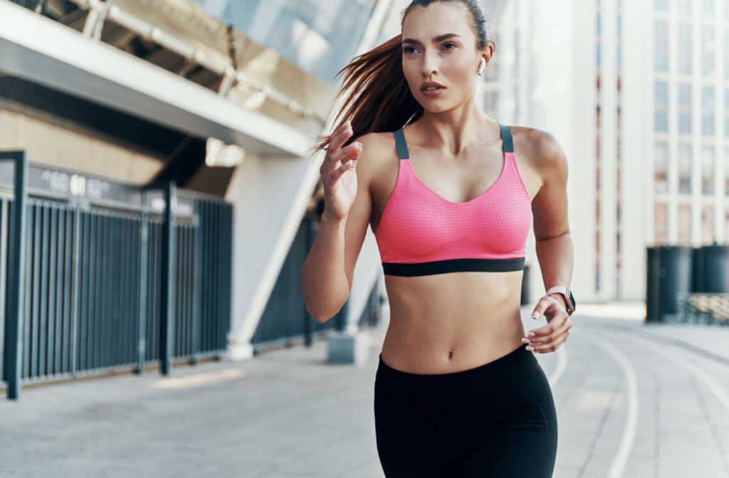 A woman running downtown.
